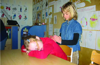 Children performing massage