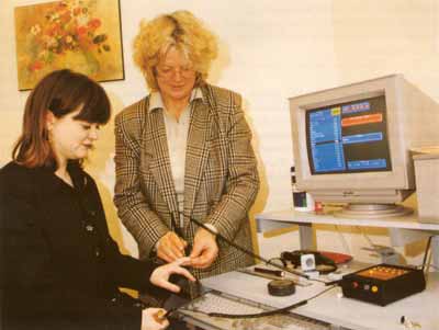 Anne Smithells (right) using the LISTEN System to screen a patient for food intolerances.