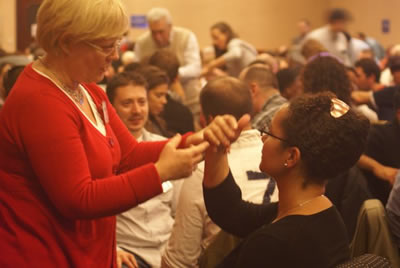NLP students demonstrate Richard Bandler's Hand Shake Interrupt Pattern Technique.