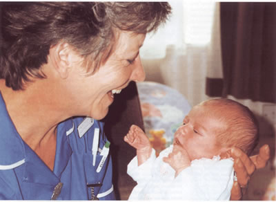 A midwife with a 1Ã‚Â½ week old baby.