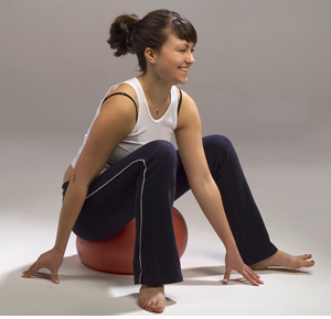 C.    (Sitting up) Spiraling Exploration: Sit on a soft almost deflated ball (I like Slo-mo fitness balls) on the floor or on a flat chair.