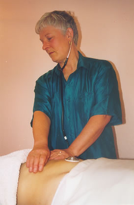A stethoscope is placed on the abdomen so that peristalsis or tummy rumblings can be heard easily.