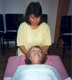 Joanne Figov performing the TMJ procedure