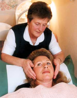 Joan Hitchco with a patient