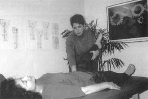 A practitioner giving treatment