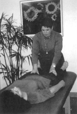 A practitioner giving treatment
