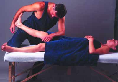 The author providing innovative massage strokes during No-Hands Massage