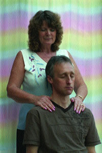 The author performing seated Angelic Reiki