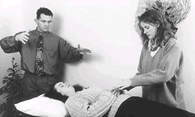 Michael O'Doherty working on a patient with another therapist