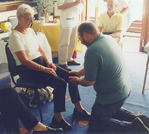 Bob Cane giving treatment to Val Lynch at the Back Awareness in Chelmsford