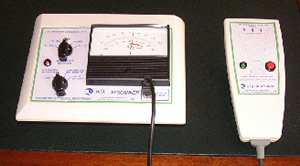 Fig. 1 Infrared Desktop Diagnostic Scanner: Meter console (left) and hand-held scanner (right). The meter consol is equipped with 'sensitivity' and 'function' control knobs.