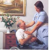 Karen Higgins, Care Assistant, administering Reiki to patient Stanley Kitler who is also attuned and giving himself Reiki.