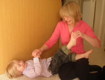 Adaptive reflexology for a toddler