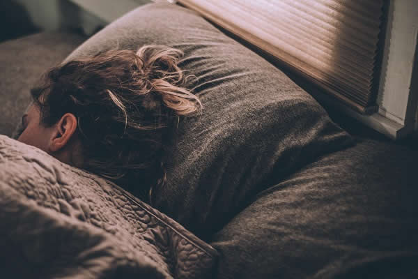 Woman Asleep by Gregory Pappas on Unsplash