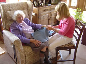 Older resident receiving Hand Reflexology