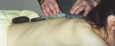 Heated healing stones are placed along the spine before the massage. The warmth of the stones penetrates the major nervous system junctions and creates a deep, relaxing effect