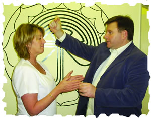 Geoff Merrigan demonstrating part of a healing strategy to a Complementary therapist
