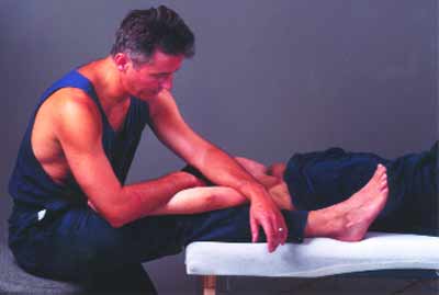 The author providing innovative massage strokes during No-Hands Massage
