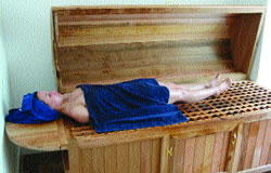 Patient in traditional Ayervedic steam chest