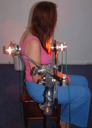 Fig. 3a Centralizing the Assemblage Point Location by Electronic Gem Therapy Apparatus. The lamps contain a mixture of carnelians and diamonds used for the hypotension spectrum. Emerald and Sapphire are used for the hypertension spectrum.