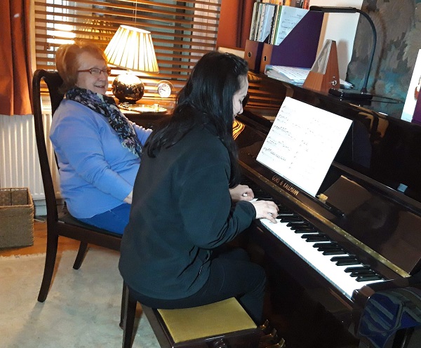 Author giving Piano Lesson