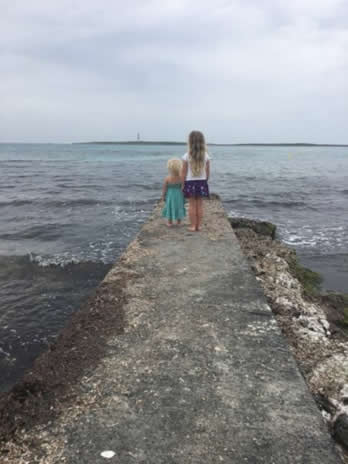 Children at the end of the pier