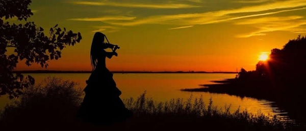Female Violinist at Sunset